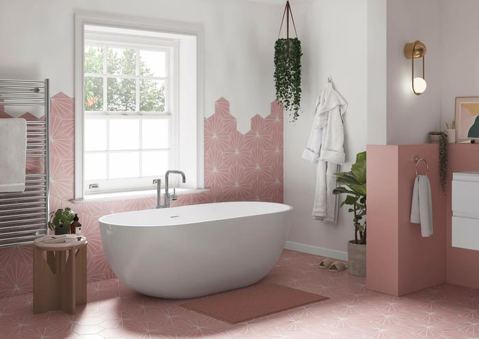 Tanaro freestanding bath in a white-tiled bathroom