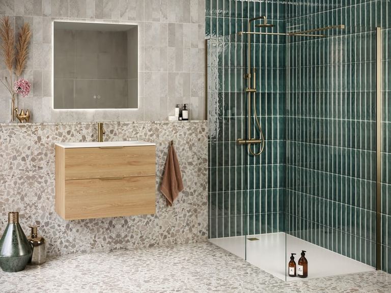 Tavo front and side panels in brushed brass with a Light Oak Cosenza vanity