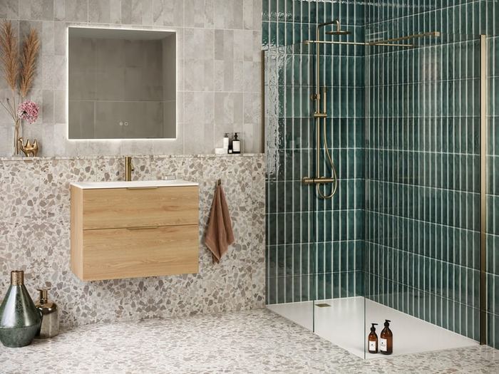 Tavo front and side panels in brushed brass with a Light Oak Cosenza vanity
