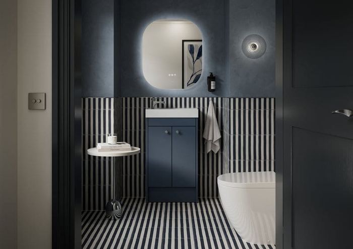 Bourton unit in Muted Blue against a striped wall