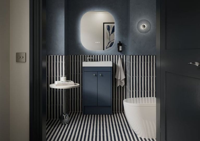 Bourton unit in Muted Blue against a striped wall
