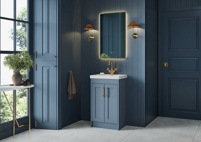 Buckland units in Muted Blue below a lit mirror