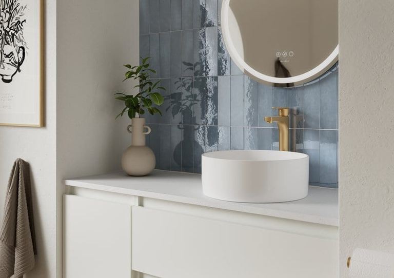 Hartley vanity in Powder White with a vessel basin and gold tap