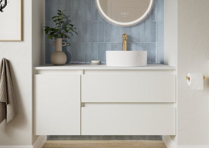 Hartley vanity in Powder White against blue tiling