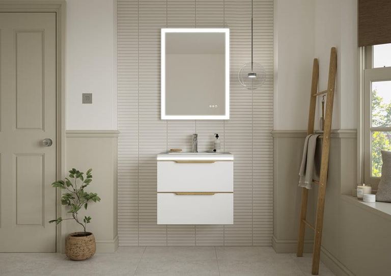 Oakley vanity in Silk White in a green-walled bathroom