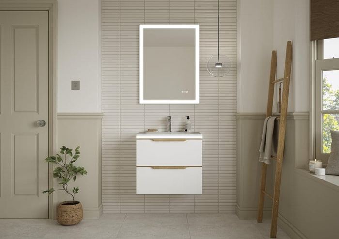 Oakley vanity in Silk White in a green-walled bathroom
